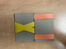 Photo showing how to fold the remaining two strips of paper